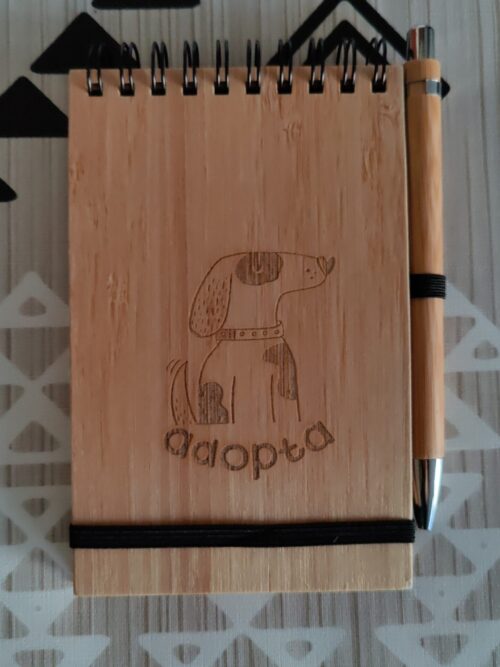 Caderno can con bolígrafo